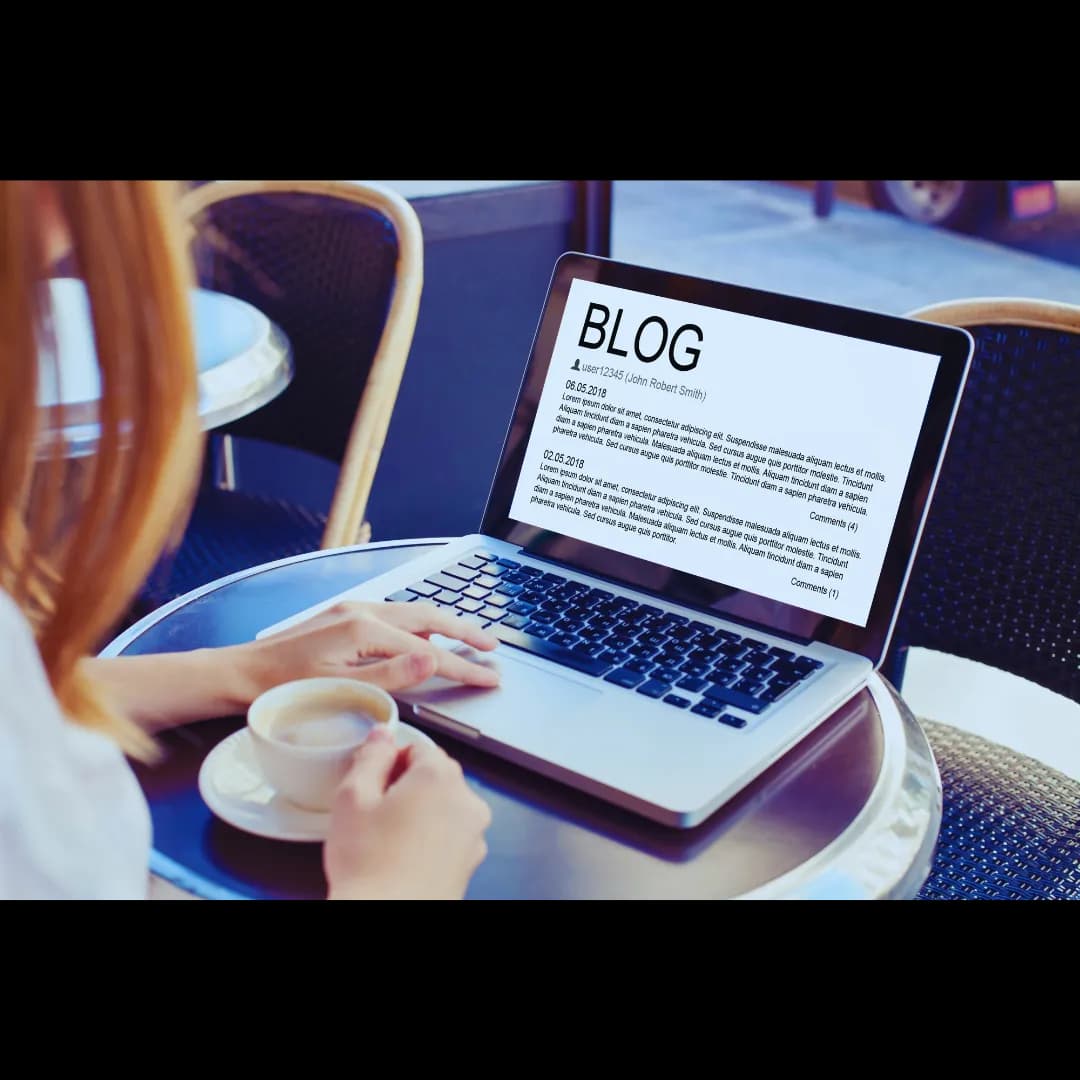 Professional writer crafting an engaging blog post, focused screen showing text and keyword research tools.