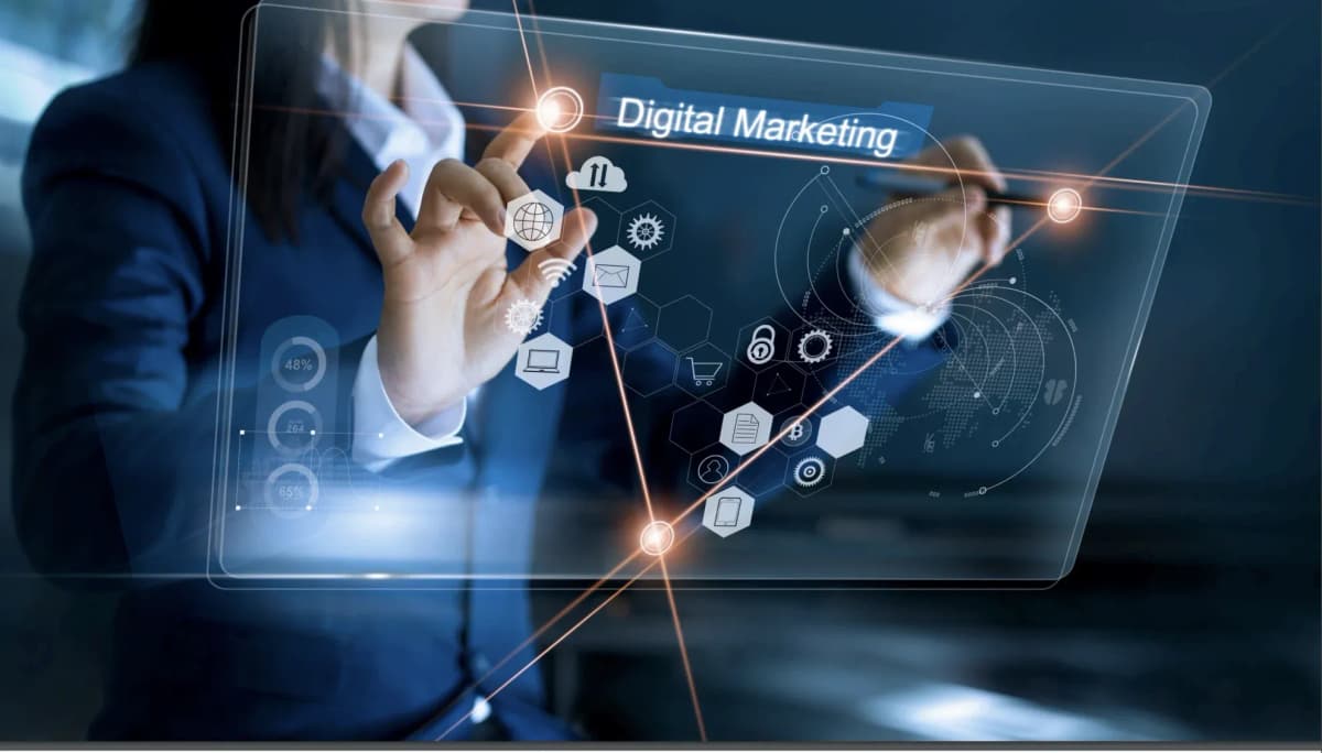 Diverse team collaborating on a multi-channel digital marketing strategy, analyzing data dashboards and creative concepts.